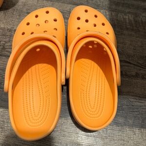 Orange crocs